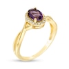 Thumbnail Image 2 of Oval Amethyst and 1/15 CT. T.W. Diamond Frame Twist Shank Ring in 10K Gold