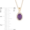 Thumbnail Image 2 of Oval Amethyst and 1/15 CT. T.W. Diamond Frame Pendant in 10K Gold