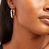Thumbnail Image 1 of 35.6mm Sculpted Hollow 14K Gold Hoop Earrings