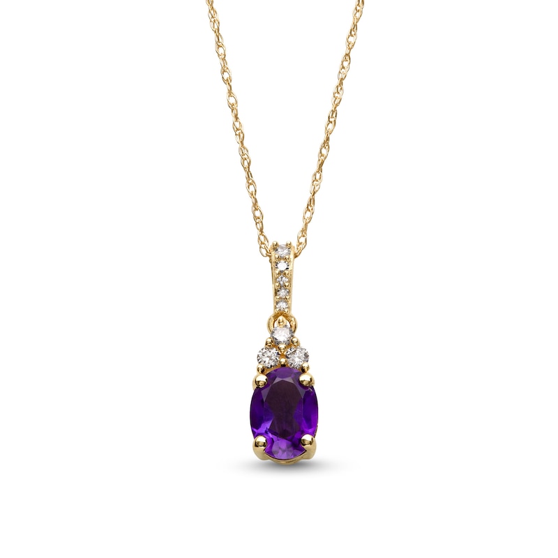 Oval Amethyst and 1/15 CT. T.W. Diamond Pendant in 10K Gold
